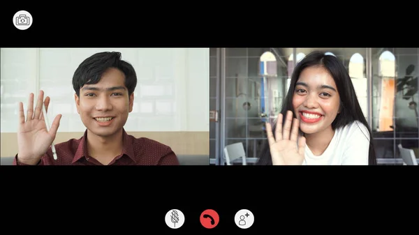 Video call screen shot the faces of Asian colleagues or partners meeting remotely with video conferences, greetings and meetings together while working from home and keep social distancing