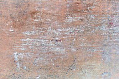 Altından, kahverengiden ve yeşilden eski boyadan çatlakları olan eski bir tahta, çatlak yüzey arkaplanı olan eski bir grunge tarzı metin, dekorasyon ya da reklam şablonu, retro sanat.