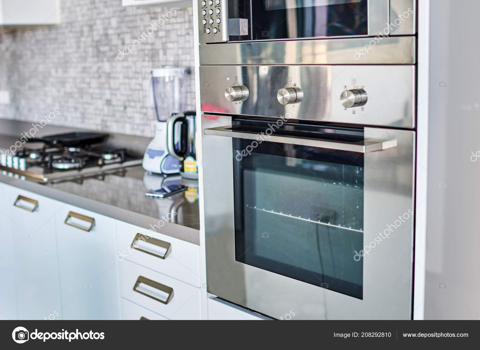 Household Appliances in Modern Kitchen Stock Photo - Image of wall