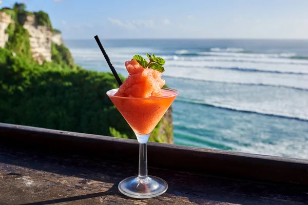 Watermelon shake cocktail with ice, tropical vacation.