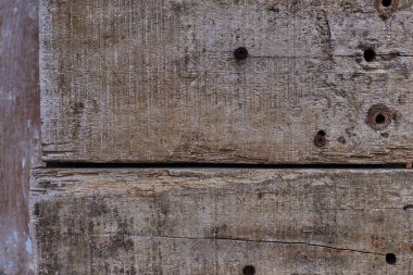 Koyu ahşap doku arka plan yüzeyi eski doğal desenli. Grunge yüzeyi ahşap doku arka plan ile. Antika ahşap doku arka plan. Paslı çivi ile eski ahşap duvar. Zamanla aşınmış yüzey.