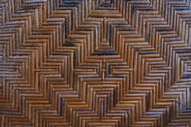 Eski karanlık bambu el sanatları ayrıntı. Ahşap bambu doku arka plan dokuma. Asya tarzı vintage doğal bambu hasır. Antika arka plan ve duvar kağıdı. Desen ve tasarım Asya tarzı bambu.