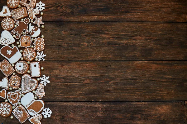 Christmas Background Gingerbread Cookies Snowflakes Pearls Old Wooden Board Copy — Stock Photo, Image