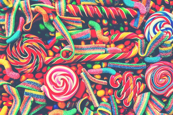 Colorful Bright Assorted Candy Canes Rainbow Colored Spiral Lollipops Scattered — Stock Photo, Image