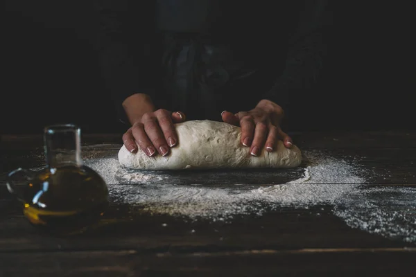 Steps of making cooking pie with ingridients. Mixing ingredients: flour, eggs, oil. See series. Step by step recipe. Cooking course or kitchen mess. Female hands make dough for biscuit or pie.