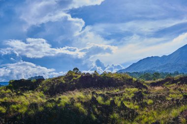 Bali Adası, Endonezya görünümünde Batur Volcano fantastik. Sabah pitoresk ve muhteşem sahne. Güzellik dünya. Parlak ışığın muhteşem vadide. Vahşi alanının bir resmi. Harika sabah dağ.