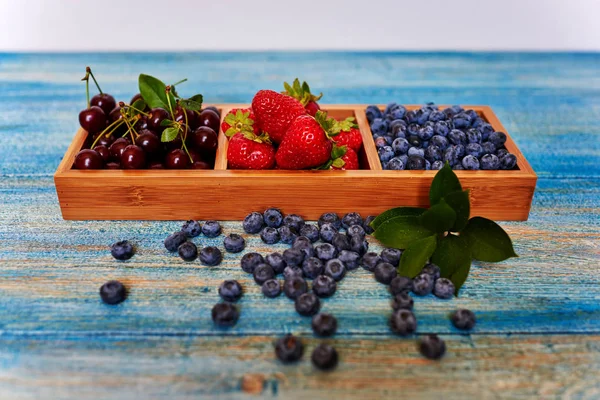 Tafel Ligt Een Blauw Vintage Houten Formulier Met Individuele Cellen — Stockfoto