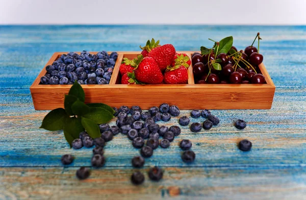 Tafel Ligt Een Blauwe Vintage Houten Vormen Voor Verschillende Snoep — Stockfoto