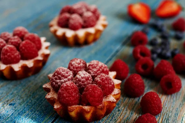 Delicious Mini Tarts Made Oatmeal Fresh Raspberries Custard Wooden Blue — Stock Photo, Image