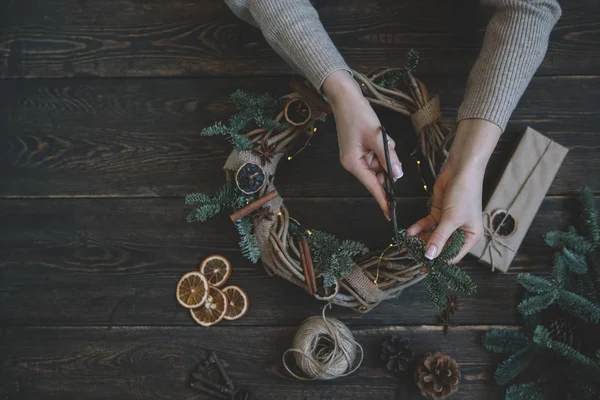 Christmas Composition Woman Making Handmade Christmas Wreath Dark Wooden Rustic — Stock Photo, Image