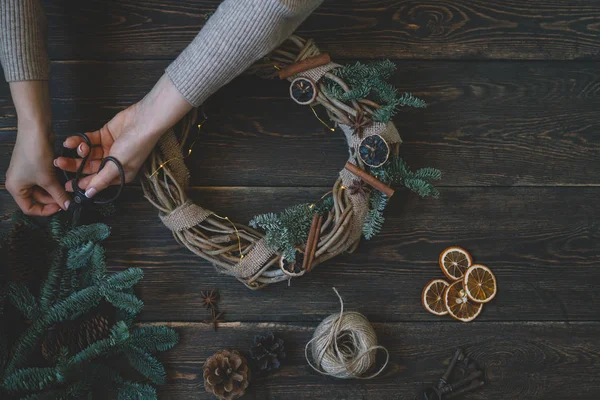 Christmas Composition Woman Making Handmade Christmas Wreath Dark Wooden Rustic — Stock Photo, Image