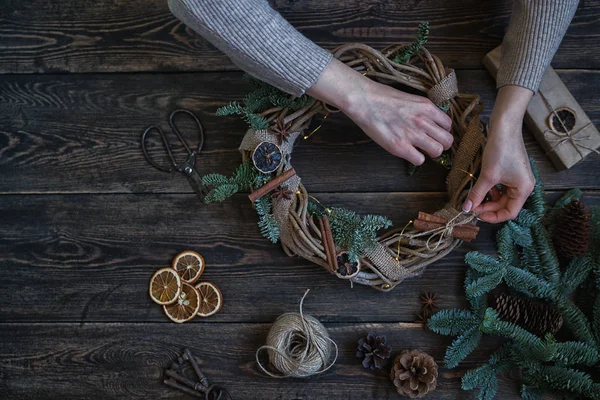 Christmas Composition Woman Making Handmade Christmas Wreath Dark Wooden Rustic — Stock Photo, Image
