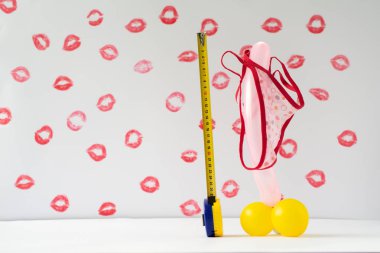 Penis measure, man power and potency, size. Big phallus with strong erection.