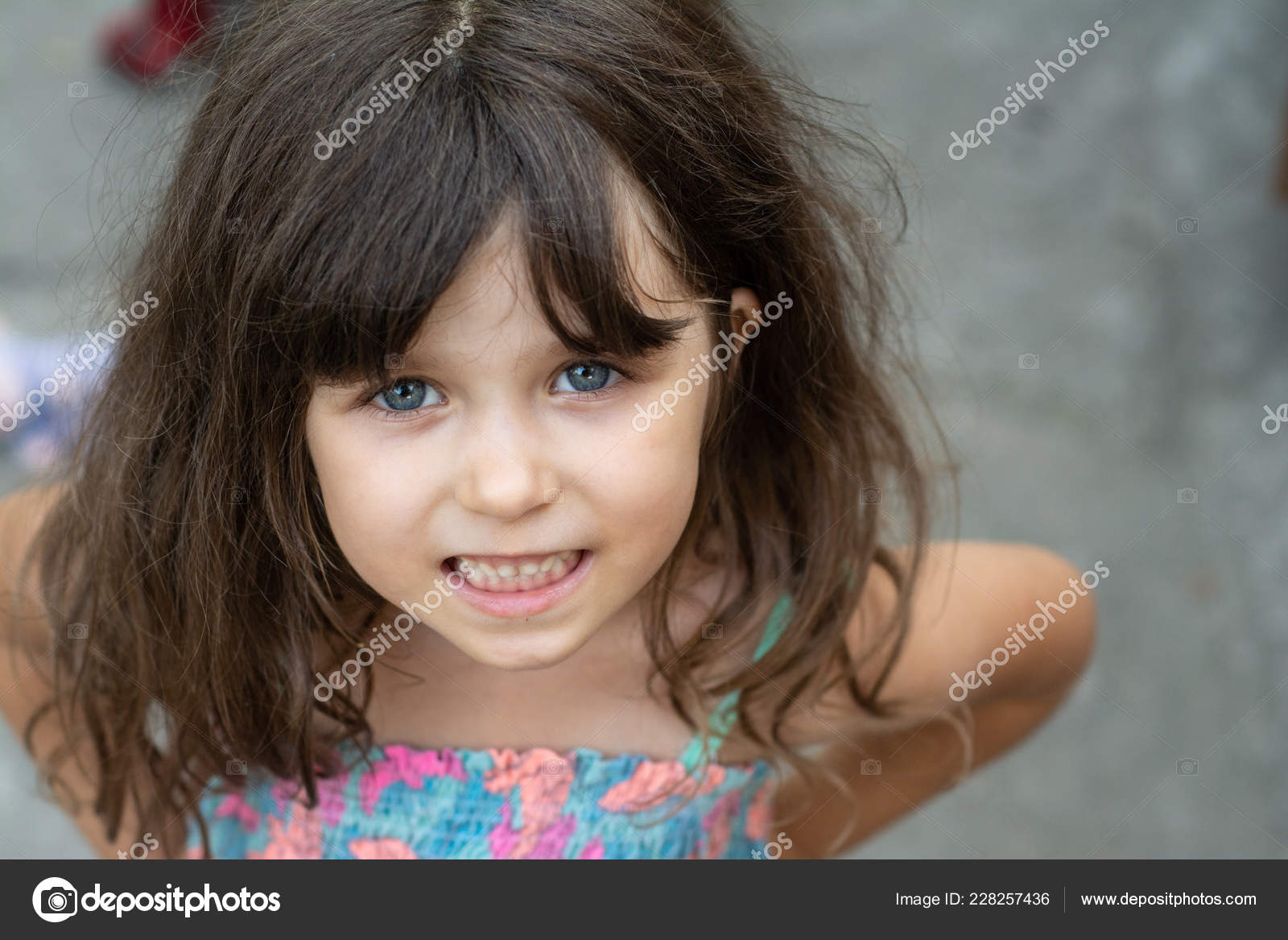 Portrait Beautiful Young Brunette Little Girl Curly Hair Blue Eyes