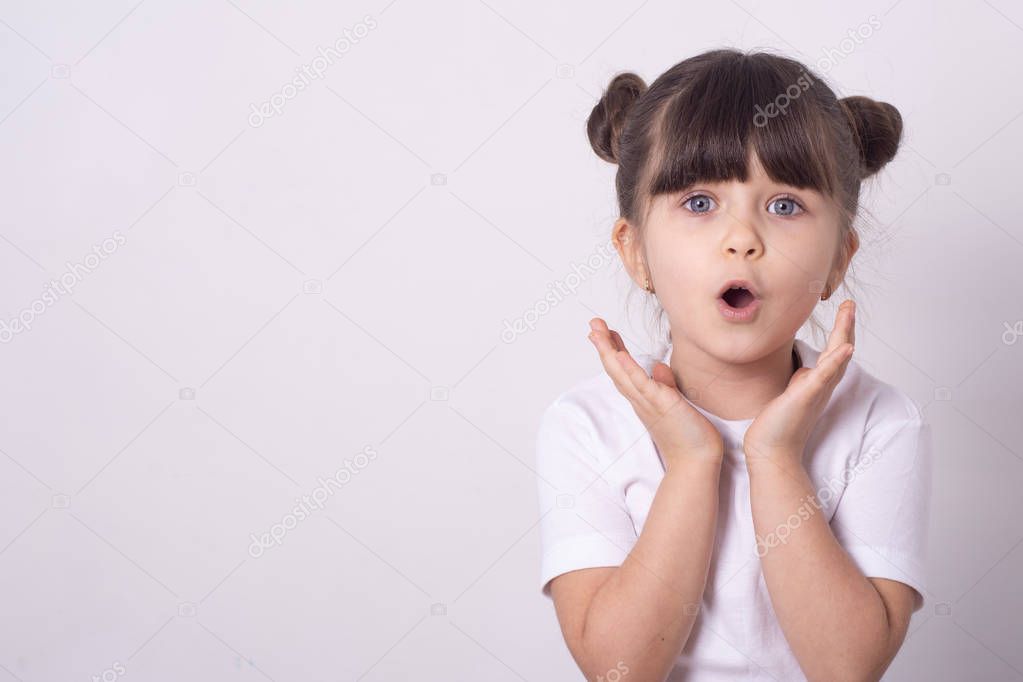 Shocked little girl having an idea. 