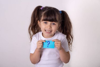 Parenting difficult child. Little girl holding sticker with question. clipart