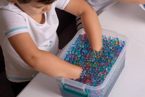 Kid Playing Orbeez Orbeez Balls Sensory Water Beads Stock Photo by