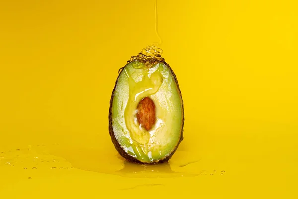 Half Ripe Avocado Honey Yellow Background Clitoral Vaginal Orgasm Vagina — Stock Photo, Image