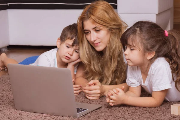 Happy Mom Floor Home Kids Watch Funny Cartoon Laptop — Stock Photo, Image