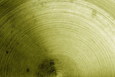 Metal yüzeyi sarı tonda çizikler ile. Arka plan ve tasarım için doku.