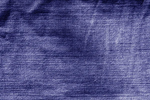 Jeans cloth pattern in blue color. Abstract background and texture for design.