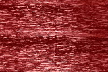 Krep kağıt ile bulanıklık etkisi kırmızı renkte. Arka plan ve doku.