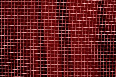 Metal kafes ızgara desen kırmızı tonda. Arka plan ve doku.