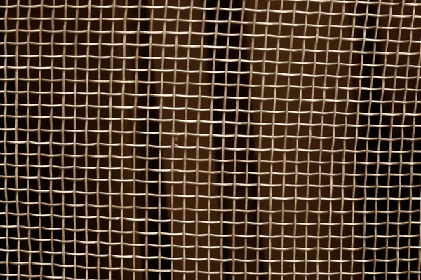 Kahverengi tonda metal kafes ızgara desen. Arka plan ve doku.
