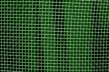 Metal kafes ızgara desen yeşil tonda. Arka plan ve doku.