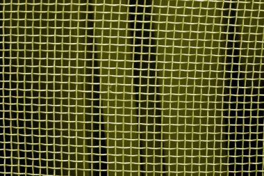 Metal kafes ızgara desen sarı tonda. Arka plan ve doku.