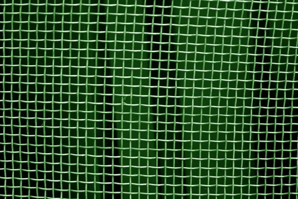Metal kafes ızgara desen yeşil tonda. Arka plan ve doku.
