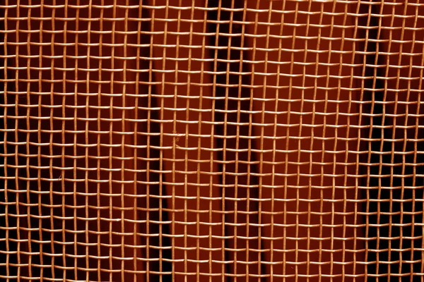Turuncu ton metal kafes ızgara desen. Arka plan ve doku.
