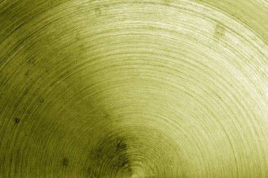 Eski metal yüzeyi sarı tonda çizikler ile. Arka plan ve tasarım için doku.