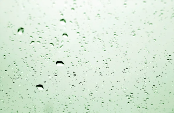 Chuva Cai Janela Carro Tom Verde Com Efeito Borrão Fundo — Fotografia de Stock