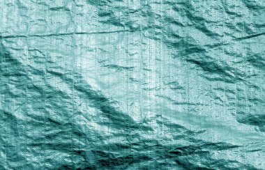 Mavi renkli plastik malzeme pürüzlü yüzeye. Arka plan ve tasarım için doku.