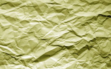 Buruşuk sayfaya bulanıklık etkisi sarı tonda. Arka plan ve tasarım için doku.