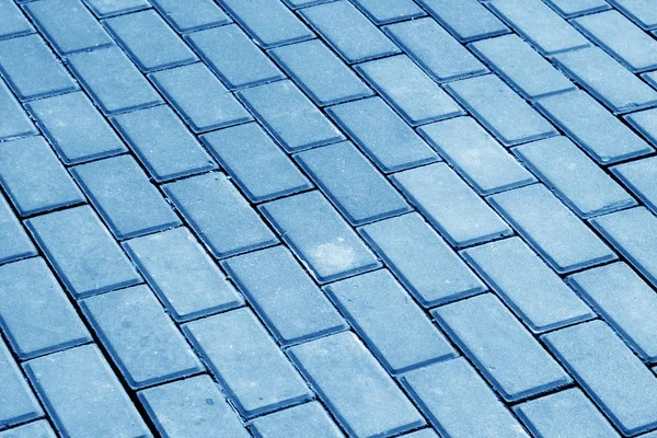 石畳のネイビー ブルーのトーンで通り 抽象的な背景とデザインのためのテクスチャ — ストック写真