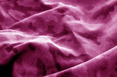 Eski Kamuflaj kumaş pembe bulanıklık etkisi ile. Arka plan ve tasarım abd fikirleri için doku.