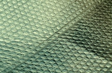 Yeşil renk parlak metal yüzey. Arka plan ve tasarım için doku.