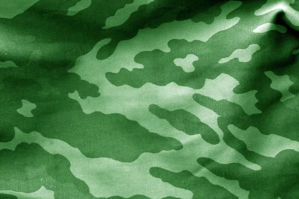 在绿色色调的模糊效果的迷彩布 抽象背景和纹理设计 Abd — 图库照片