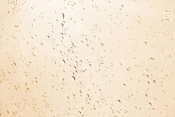 Krople Wody Blured Okno Pomarańczowy Odcień Sezonowy Tło Tekstura Projektowania — Zdjęcie stockowe