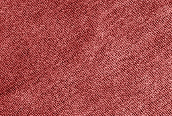Linen cloth texture in red color. Abstract background and texture for design.