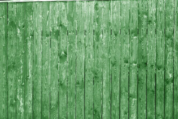 Old wooden wall in green color. Abstract background and texture for design.