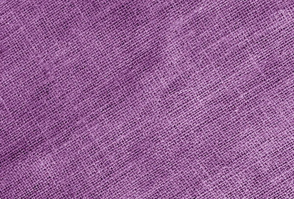 Linen cloth texture in purple color. Abstract background and texture for design.
