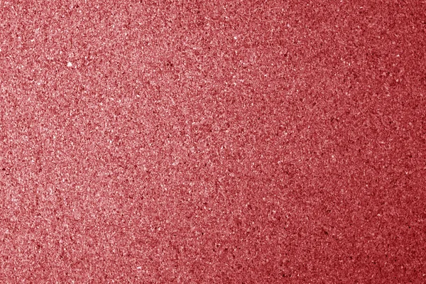Natural cork texture in red color. Abstract background and texture for design.