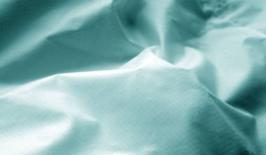 Camgöbeği rengi buruşuk şeffaf plastik yüzey. Arka plan ve tasarım için doku.