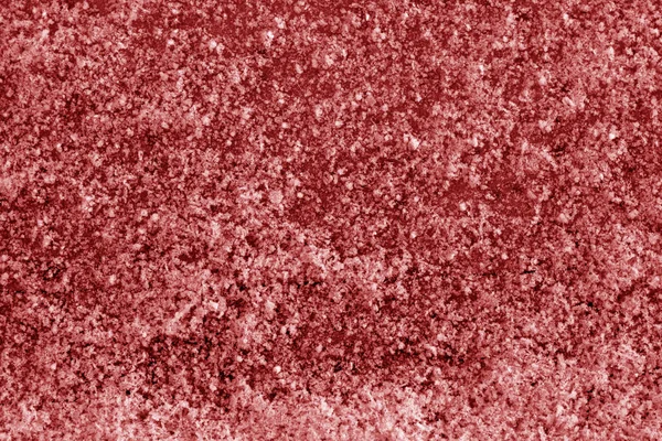 Frost on car glass texture in red tone. Abstract background and texture for design.