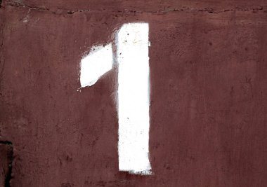 No 1 şablonda metal duvar. Arka plan ve tasarım için doku.