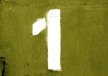 Metal şablonda 1 numara sarı renkte duvar. Arka plan ve tasarım için doku.