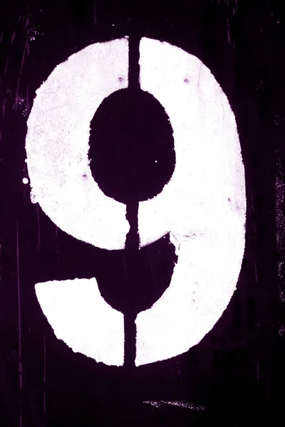 Number 9 in stencil on metal wall in purple tone. — Stock Photo, Image